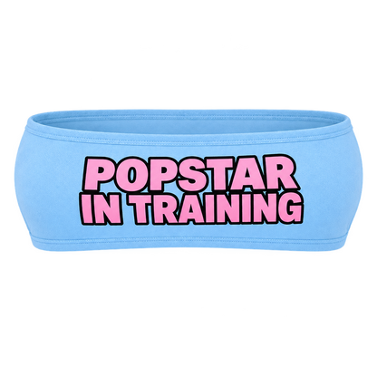 Ice blue bandeau top with pink POPSTAR IN TRAINING lettering