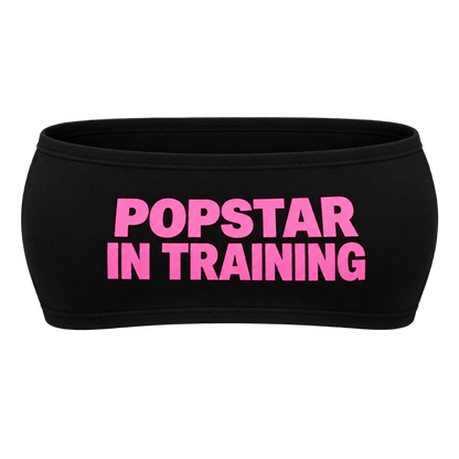 Black bandeau top with pink POPSTAR IN TRAINING lettering